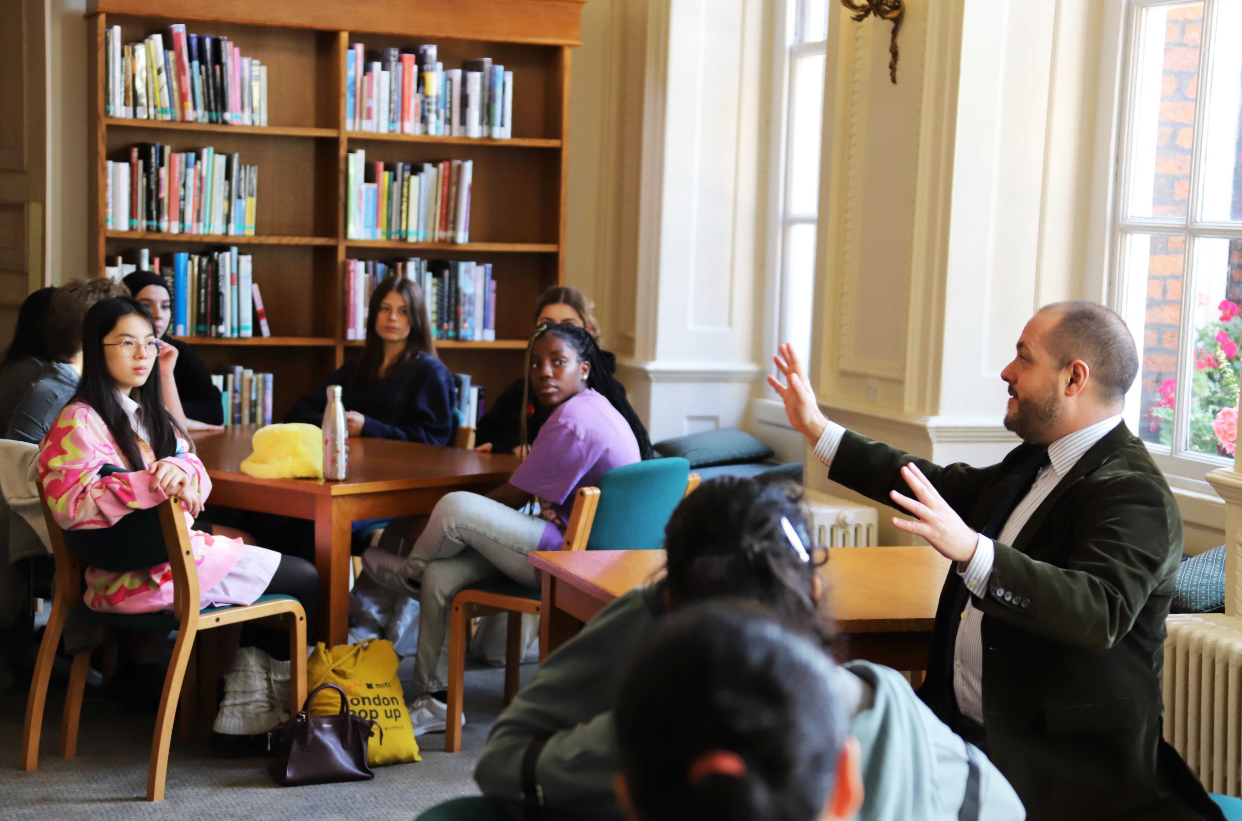 A History Teacher Telling A Class Of Platform Liberal Arts Students About The Cotton Fire In 1731 In The Library At Westminster School Scaled